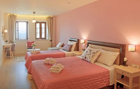 Family room with lake view at Arktos Boutique Hotel